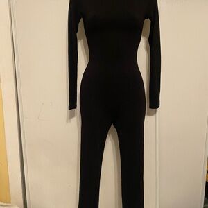 Nwt’s naked wardrove jumpsuit size S color black